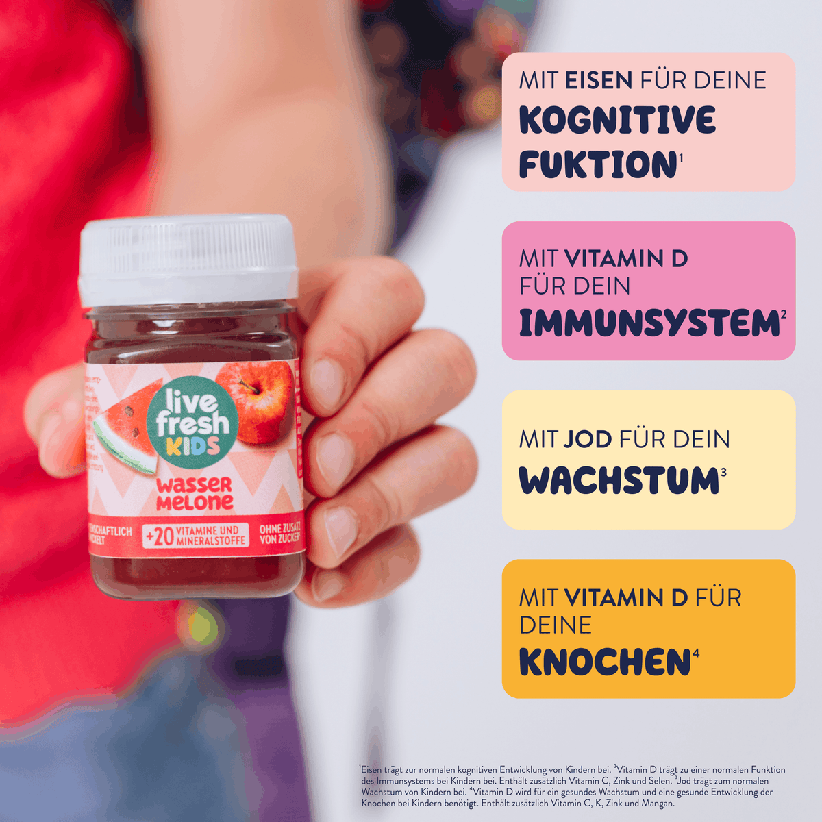 A child holds a bottle of liveFresh Kids Watermelon up to the camera. Next to it is the text: "WITH IRON FOR YOUR COGNITIVE FUNCTION. WITH VITAMIN D FOR YOUR IMMUNE SYSTEM. WITH IODINE FOR YOUR GROWTH. WITH VITAMIN D FOR YOUR BONES."