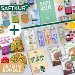 LiveFresh Abnehmbundle und Saftkur Produkte mit Protein Drinks. Funktionsgetränken. Slim Support. Slim Shake. Vegan Tikka Masala und Porridge. Im Mittelpunkt liegen die Guides mit der Aufschrift "Saft Kur. Dein Guide zur Saftkur" und "4 Tage Abnehm Bundle. Dein Guide". Große Beschriftungen zeigen außerdem "Saftkur" und "Abnehm Bundle".